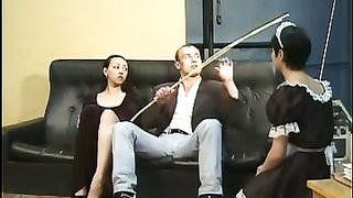 Submissive maid in stockings gets caned in hardcore style