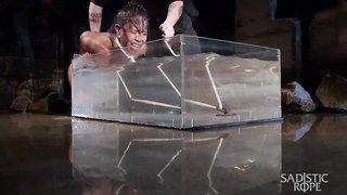 Interracial water bondage featuring a sub ebony