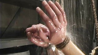 Cold water and a giant dildo rod for a masochistic slave