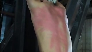 Extremely painful spanking in the basement with a sub blonde