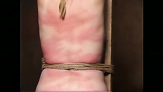 Square ass slut has it slapped hardly while facing a wall