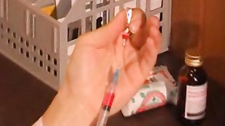 Good babe with cute face puts injections in those beautiful ass