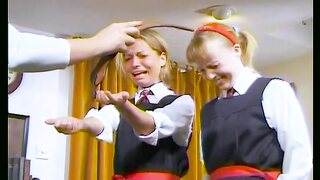 British style discipline for two schoolgirls