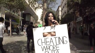 Naked MILF with a whore banner walking around the world