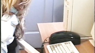 Slender secretary in stockings enjoys bondage