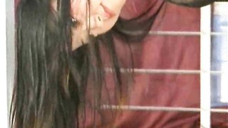 Cute Asian chick in red dress hangs upside down during dirty games