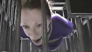 Slave bitch is in her cage, hanged and hogtied