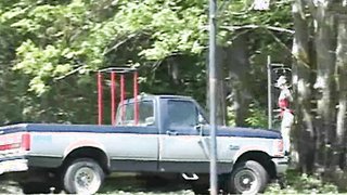 Hillbilly uses his truck to display his slave to neighbors