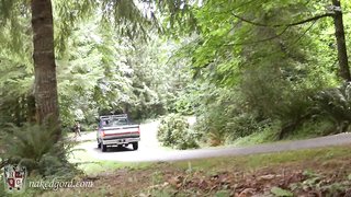 Naked slut attached to a truck gets a drive-around