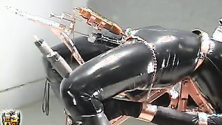 Simultaneous mouth and pussy deepthroat in shiny latex
