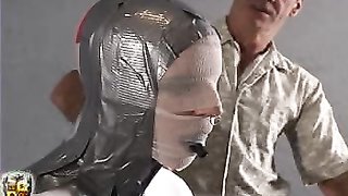 Submissive bitch bound and gets mummified with duct tape