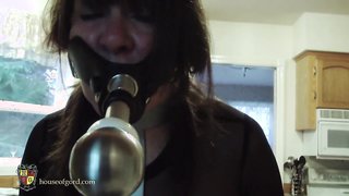 Stupid mature forced to clean the house with her mouth gag