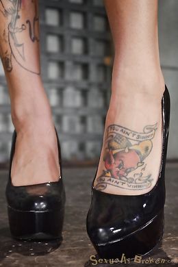 Elegant slut in leather straitjacket sucks like a pro