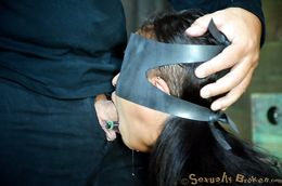 Elegant masked ebony with a wide boner in her mouth