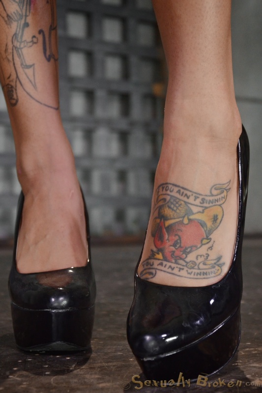 Elegant slut in leather straitjacket sucks like a pro