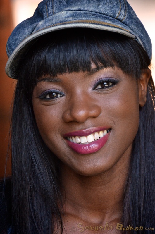 Suspended athletic ebony with a white dick in the mouth