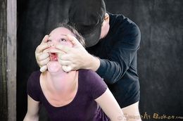 Cuffed babe with round bottom face fucked on the knees